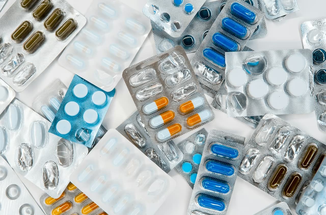 GLP-1 medication kit on a soft neutral background